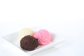 Colorful ice cream on white background