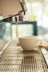 Espresso coffee machine, At first step prepares machine for make a coffee (Selective focus and shallow depth of field)
