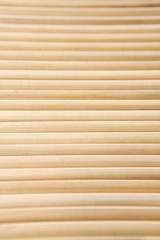 A couple of wooden pencils stacked together.