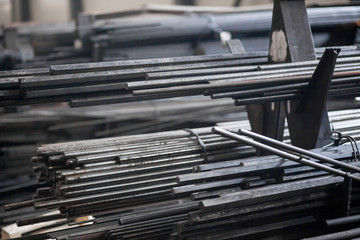 Obraz premium Warehouse of a metal bar of pipes