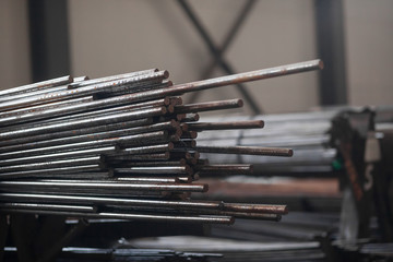 Warehouse of a metal bar of pipes