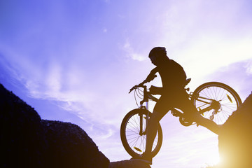 Fototapeta na wymiar Extreme mountain bike sport athlete man riding outdoors lifestyle trail.