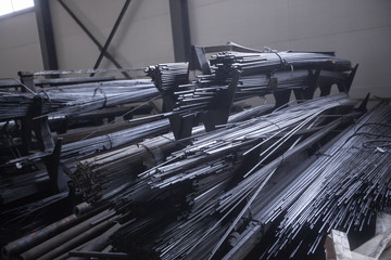 Warehouse of a metal bar of pipes