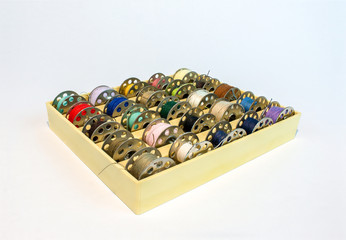 Bobbin tray with colorful sewing thread