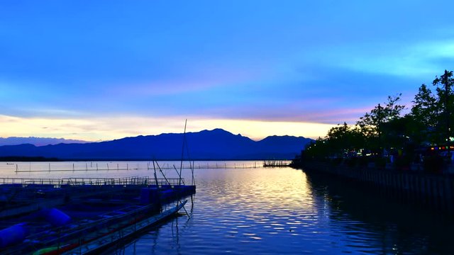 4K time lapse video of Kwan Phayao lake in the evening, Thailand.