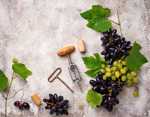 Grape, wine and vintage corkscrew