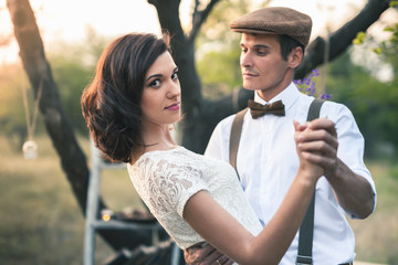 Young Couple Have Got Marriage In Rustic Style In Apple Orchard