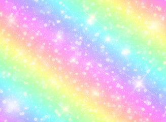 Vector illustration of galaxy fantasy background and pastel color.The unicorn in pastel sky with rainbow. Pastel clouds and sky with bokeh. Cute bright candy background . © UHDHDR
