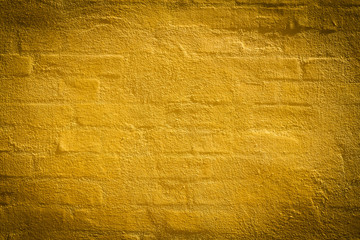 Naklejka premium Old Vintage yellow brick wall. Grunge Backgrounds.
