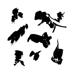 black vector spots and blots on a white background