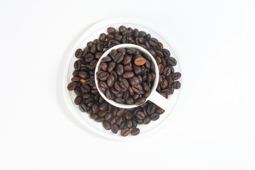 Coffee bean white ceramic cup saucer on white background
