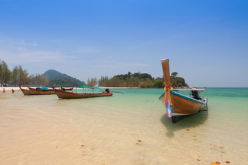 Fototapeta na wymiar Traditional Thai boats on the beach. Thailand