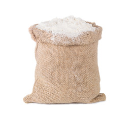 Wheat flour in burlap sack bag isolated on white background
