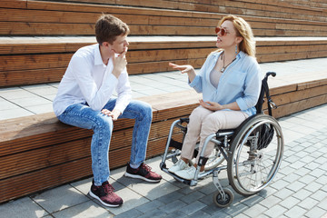 Woman in a wheelchair using a ramp