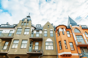 Multicolored facades of buildings in Helsinki, the capital of Finland, the traditional Scandinavian architecture, Ullanlinna, Huvilakatu