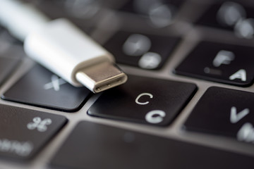 The cable with the type-c connector is on the keyboard