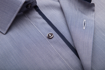 Piece of cotton shirt. Pure cotton fabric. Classic men's shirt collar detail 