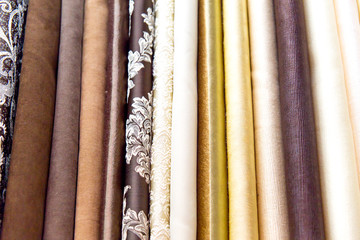 Rolls of fabric and textiles in a shop or store