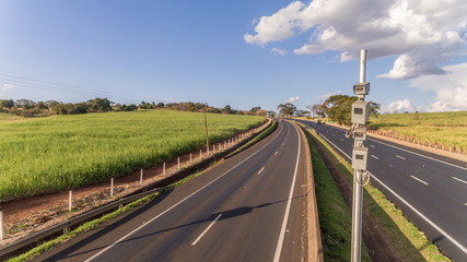 Traffic radar with speed enforcement camera in a highway. Automatic number plate recognition used...