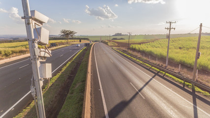 Traffic radar with speed enforcement camera in a highway. Automatic number plate recognition used for the detection of average speeds
