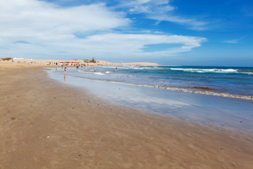 Sandy beach in Maspalomas, Gran Canaria, Canary islands, view of the sea, beach, blue sky, selective focus