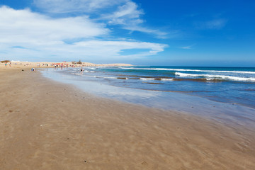 Sandy beach in Maspalomas, Gran Canaria, Canary islands, view of the sea, beach, blue sky, selective focus