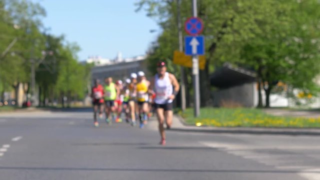 Leader marathon runners in 4K slow motion 60fps
