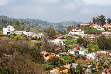 Naklejka premium Rocks and forests, fields, houses near Roque Nublo Tejeda, Gran Canaria, selective focus