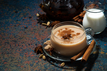 spicy tea masala on a dark background, top view