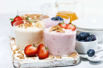 sweet yogurts with fruit and berries for a delicious breakfast