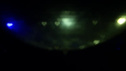 Blurred mirror disco ball in bokeh heart - Powered by Adobe