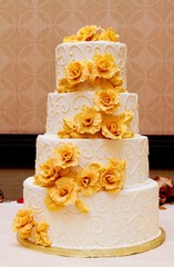 Wedding cake embellished with Yellow gold flowers
