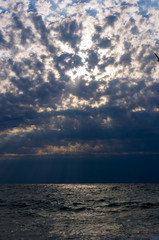 Amazing sea sunset, the sun, waves, clouds