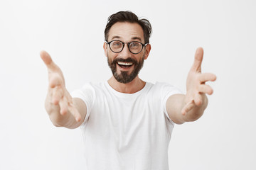 Hey long time no see. Surpirsed happy and joyful old friend in glasses with beard and moustache,...