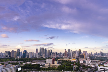 Fototapeta premium cityscape Bangkok sunset skyline, Thailand. Bangkok is metropolis and favorite of tourists live at between modern building / skyscraper, Community residents