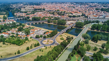 Aerial top view of Beziers town, river and bridges from above, South France
