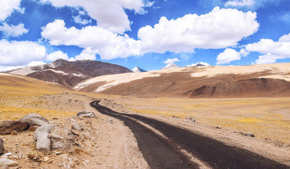 Fototapeta na wymiar Mountain highway road surrounded with scenic landscape view at Ladakh India.