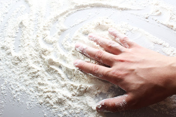 flour hand on a light background