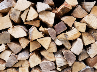 Abstract Background : Pile of firewood. Cross section of firewood.