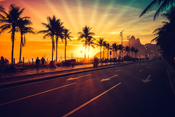 Amazing Sunset on Ipanema Beach with sun rays, Rio de Janeiro, Brazil - Powered by Adobe