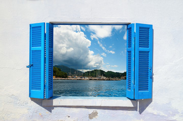 Sea view through traditional greek window