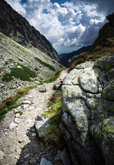 stone path toward the valley