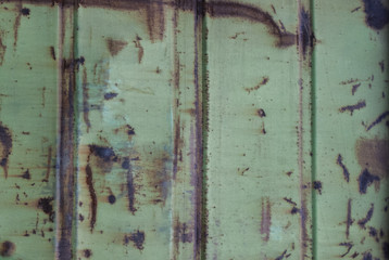 Texture of old, rusty metal with peeling paint