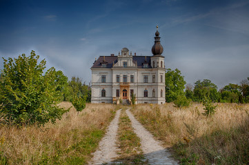 Fototapeta na wymiar Palace in the village Biskupice Podgorne in summer
