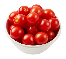 Fresh ripe tomatoes in ceramic bowl isolated on white background. Ingredients for cooking. Top view.