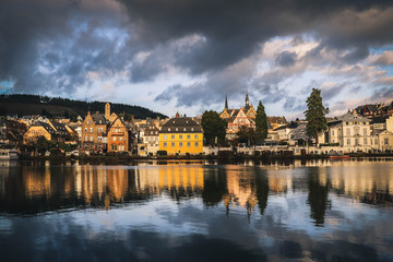 Obraz premium Reflection of a small town in Germany