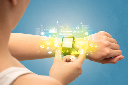 Hand with smartwatch and health medical tracker concept. 