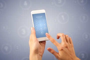 Female fingers touching smartphone with locked device requiring passcode