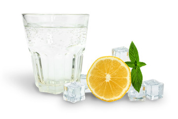 glass of soda next to ice, mint and orange, ingredients for lemonade