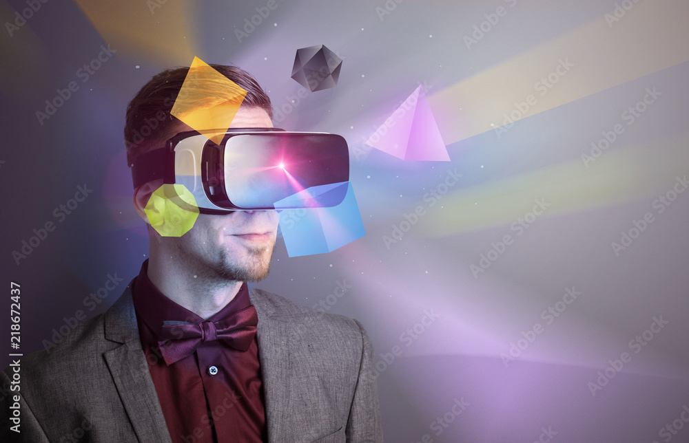 Poster amazed businessman with virtual reality colorful geometric shapes in front of him